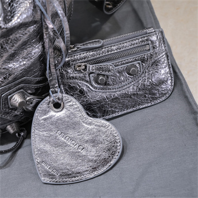 Women’s Le Cagole Small Bucket Bag In Metallized Arena Lambskin Silver Color