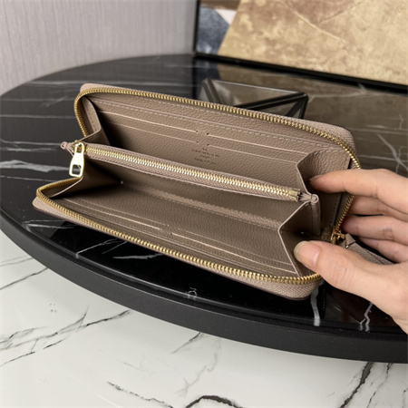 LV  Clémence Wallet Monogram Empreinte Leather Tourterelle M82338