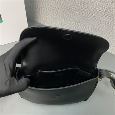 Prada Arqué leather shoulder bag with flap Black 1BD365