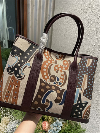 Her.mes  Garden Party 36CM Togo Leather and Graffiti Canvas HS