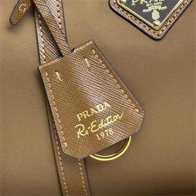 Prada Re-Edition 1978 medium Re-Nylon and Saffiano leather top-handle bag Cork Beige 1BB233
