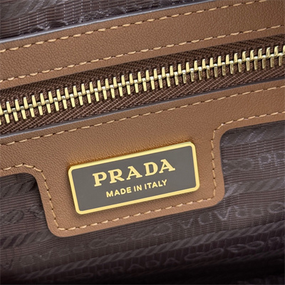 Prada Re-Edition 1978 medium Re-Nylon and Saffiano leather top-handle bag Cork Beige 1BB233