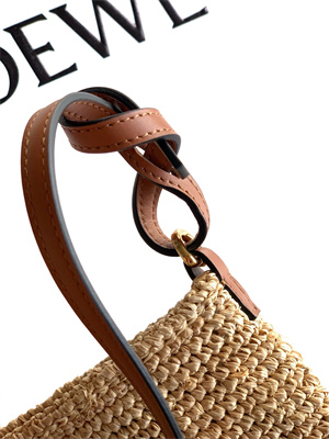Loewe Slit pochette bag in raffia and calfskin Nature /Tan