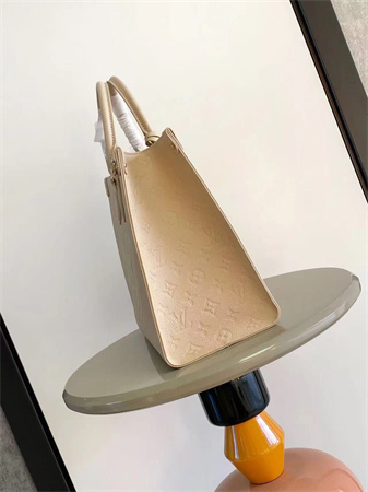 L.V ONTHEGO MM Monogram Empreinte Leather Sand M14255